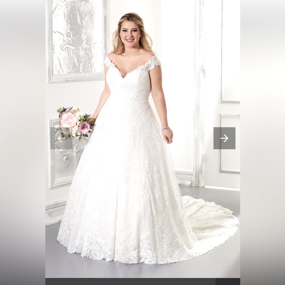 Mori Lee Dresses & Skirts - New, never altered wedding dress with tags